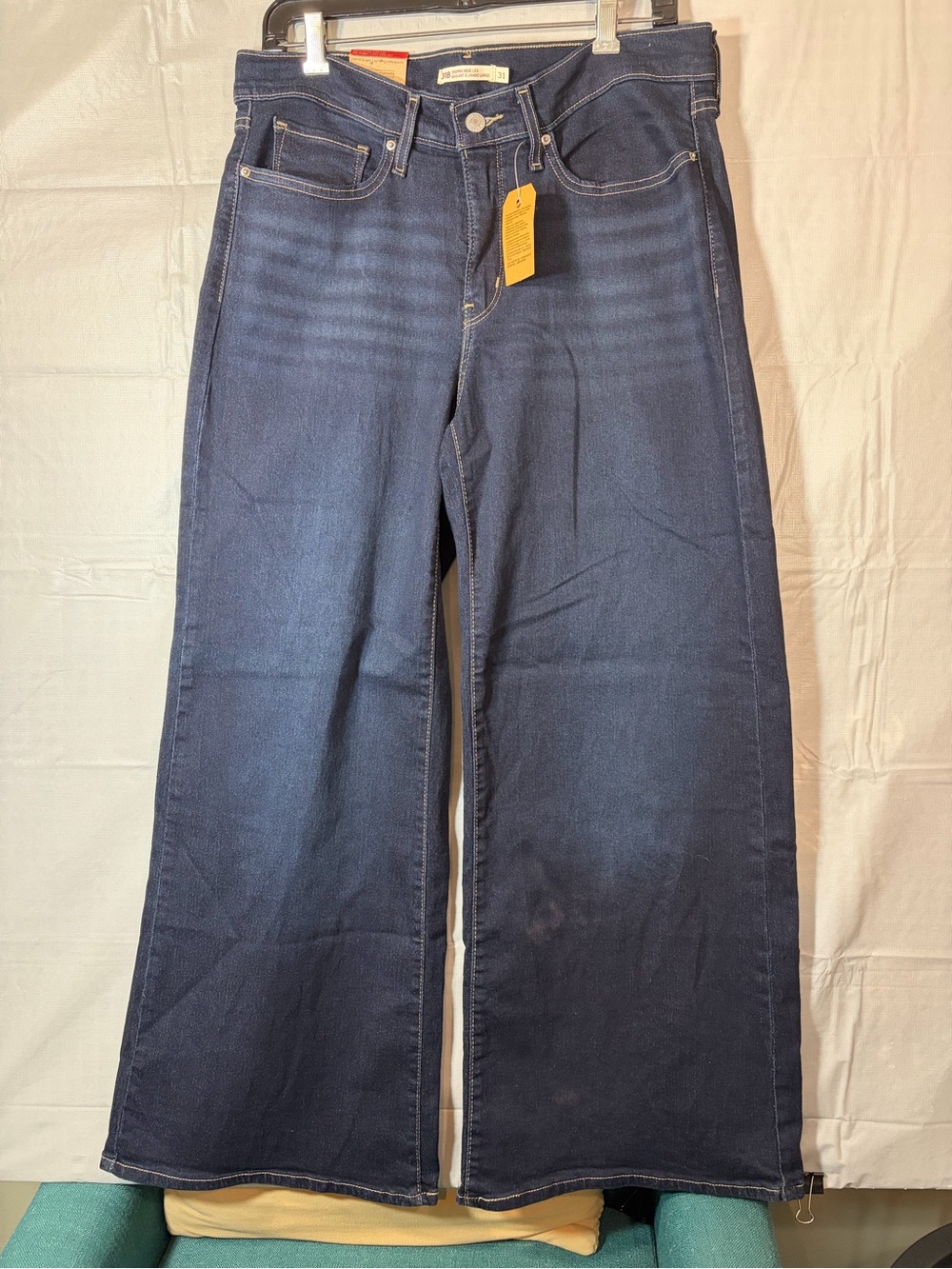 151. Levi’s 318 Shaping Wide Leg Dark Blue Jeans